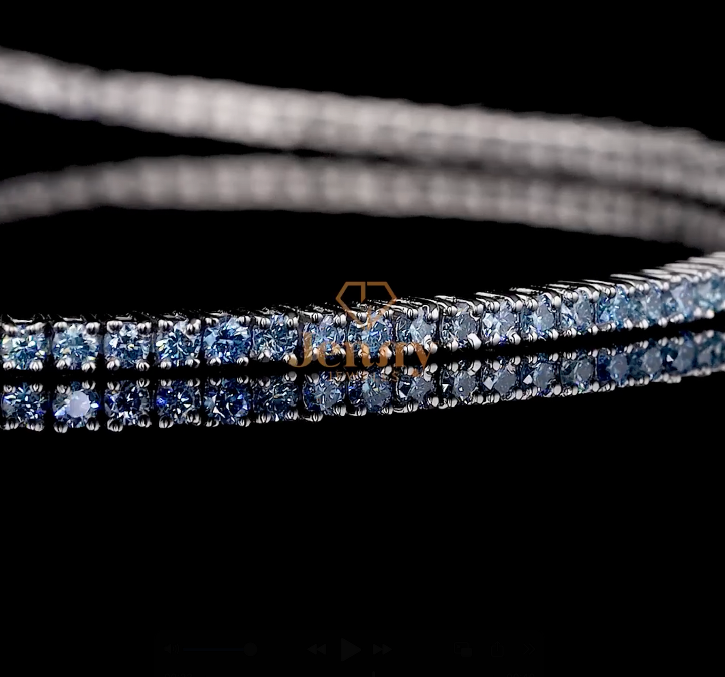 Vivid Blue Diamond Tennis Bracelet with 1.50 CT of round-cut blue diamonds set in white, yellow, or rose gold. A striking and elegant jewelry piece.
