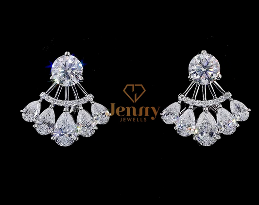 Convertible Diamond Earrings with a round center diamond and foldable pear-cut diamond surround, set in white, yellow, or rose gold. A luxurious and versatile jewelry piece.