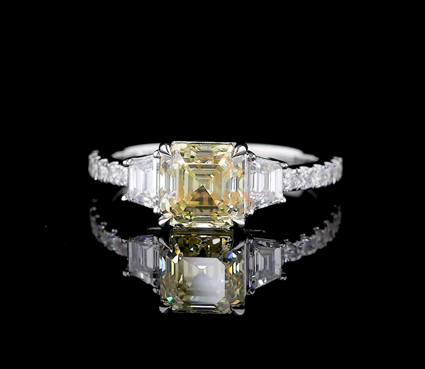 Vivid Yellow Asscher-Cut Diamond Ring with a 2.72 CT yellow diamond and round white diamond accents, set in white, yellow, or rose gold. A rare and elegant masterpiece.