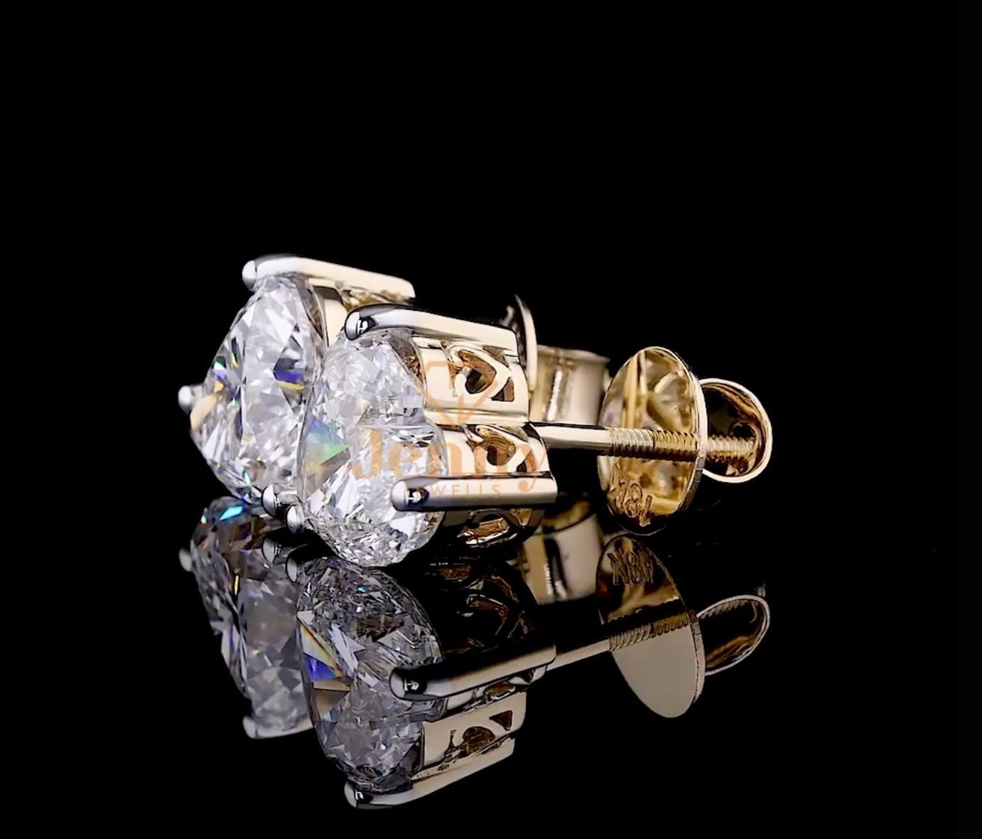 Heart-cut diamond earrings set in 14K or 18K white gold. A romantic and elegant jewelry piece, perfect for special occasions and everyday wear.