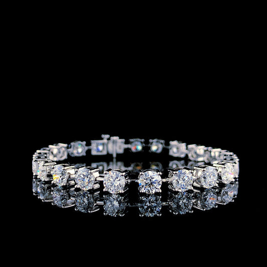 Round Diamond Tennis Bracelet with brilliant-cut diamonds set in white, yellow, or rose gold. A timeless and elegant jewelry piece designed for luxury and everyday wear.