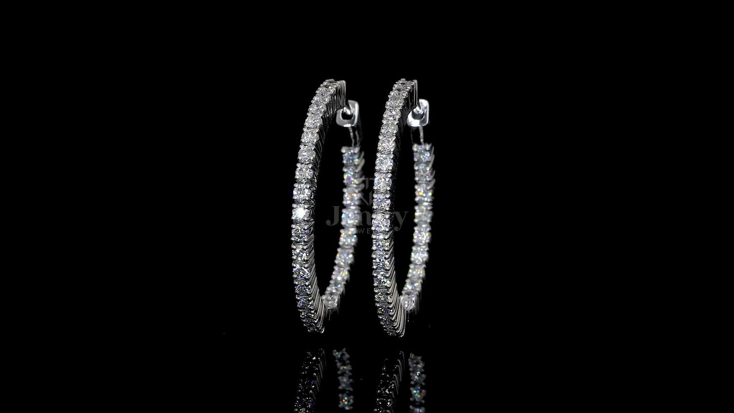 Close-up of 56 finely set lab-grown diamonds on bangle-style hoop earrings
