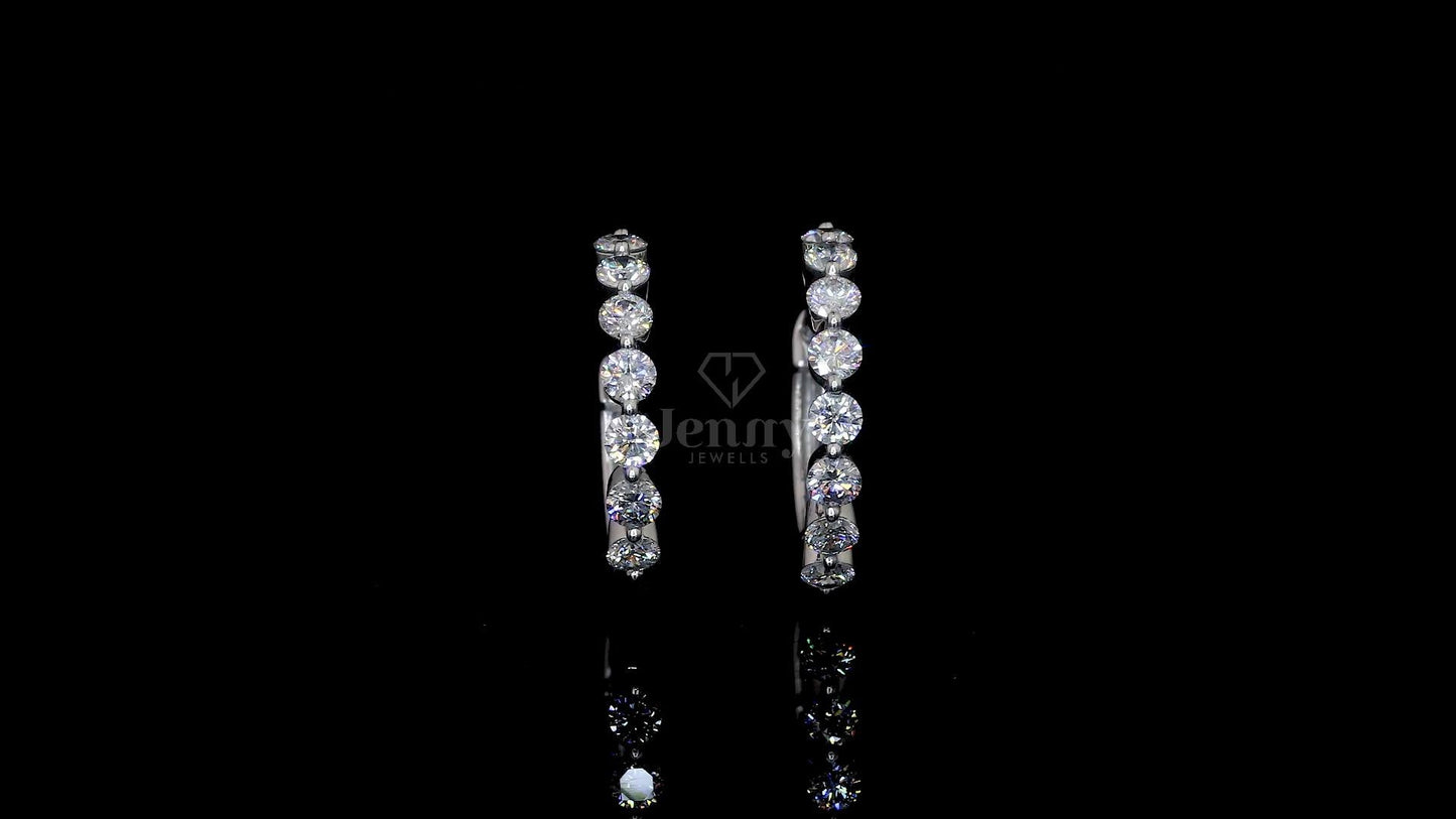 Elegant lab-grown diamond hoop earrings in white gold featuring 16 round diamonds totaling 1.60 carats.